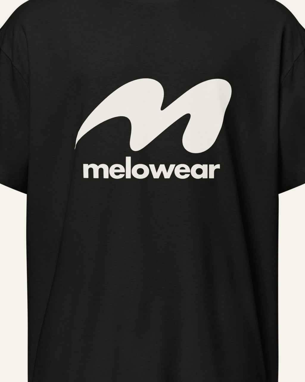 Close up of the white melowear logo printed on black cotton