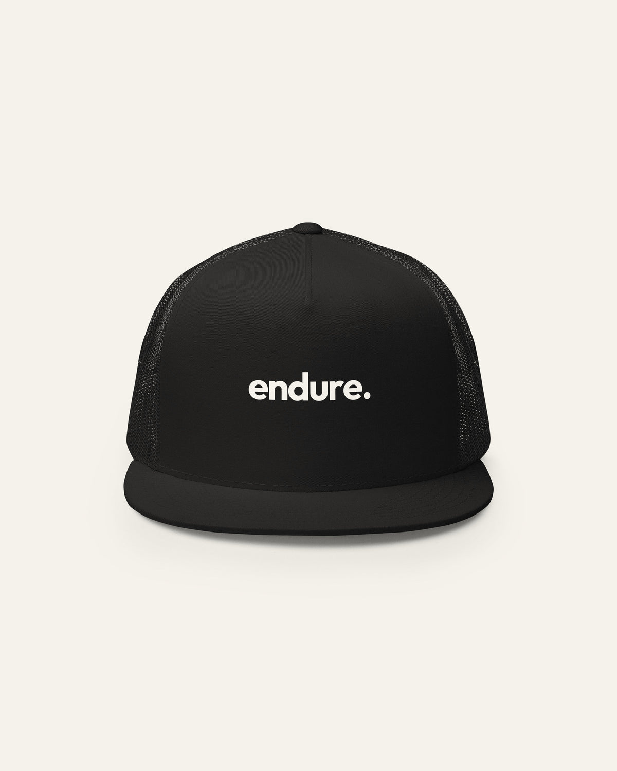 Black melowear endure. trucker cap from the front, wordmark printed on the panel