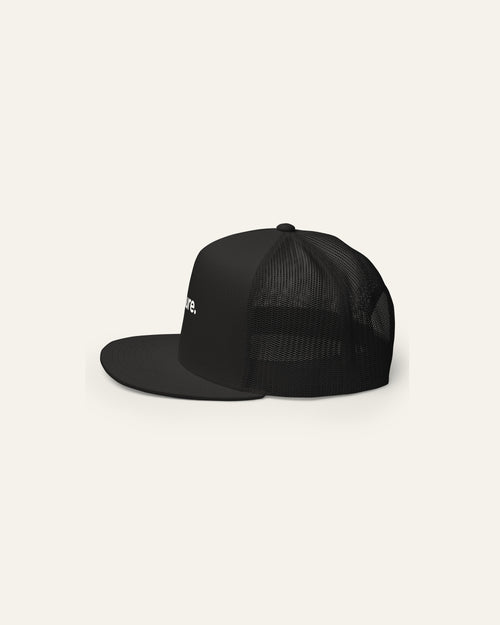 Black endure. trucker cap from the left, mesh back panels